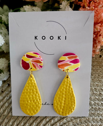 Yellow textured dangle earrings