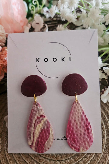 Pink textured dangle earrings