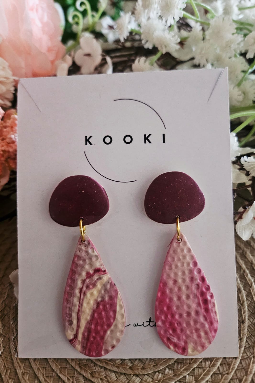 Pink textured dangle earrings